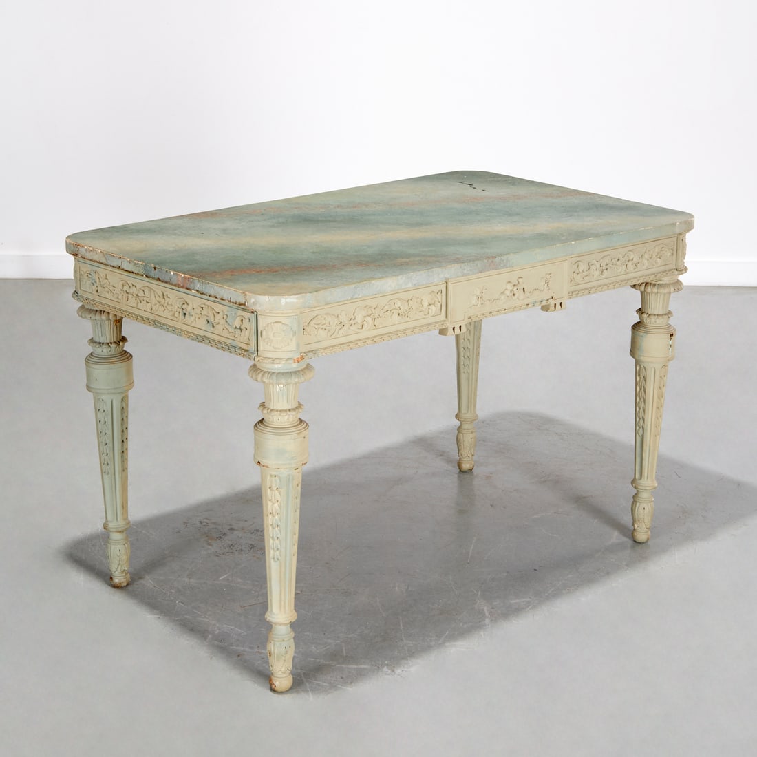 Louis XVI style green painted bureau plat: Louis XVI style green painted bureau plat, First half 20th c., faux painted marble top with scroll and cherub sides, drawer to each side, on tapered legs, 30.5"h x 48"w x 29"d Provenance: The Iris Apf
