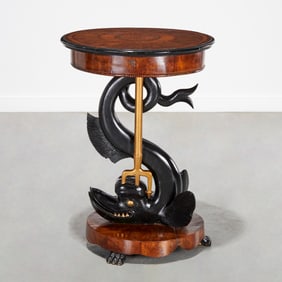 Continental Neoclassic ebonized "Dolphin" gueridon