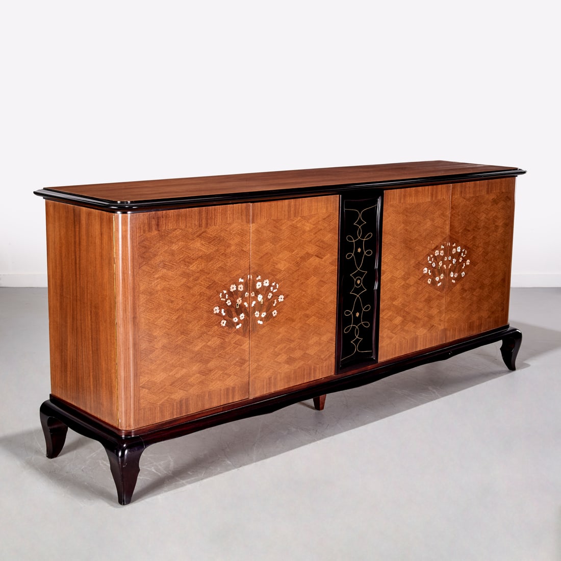 Jules Leleu (manner), Art Deco sideboard: Jules Leleu (manner), Art Deco sideboard, Manner of Jules Leleu (French, 1883-1961), outset corners to top with black lacquer border, four panel doors with mother-of-pearl floral inlay flanking black