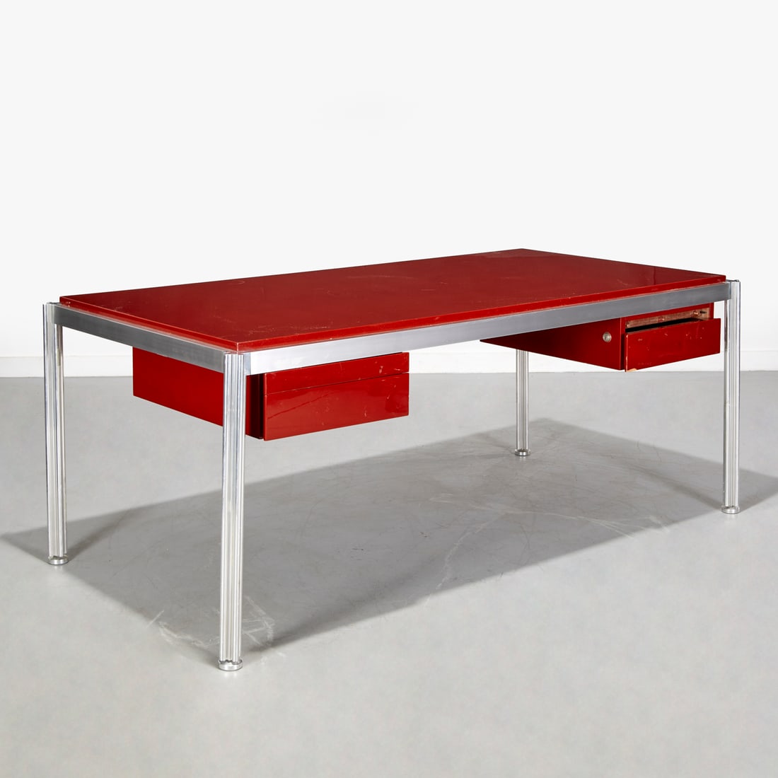 George Ciancimino, executive desk: George Ciancimino, executive desk, Late 20th c., dark red lacquer and polished aluminum, with two pull-out writing surfaces and two drawers, unmarked, 29.5"h x 72.5"w x 38"d