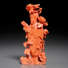 Chinese carved coral vase and cover