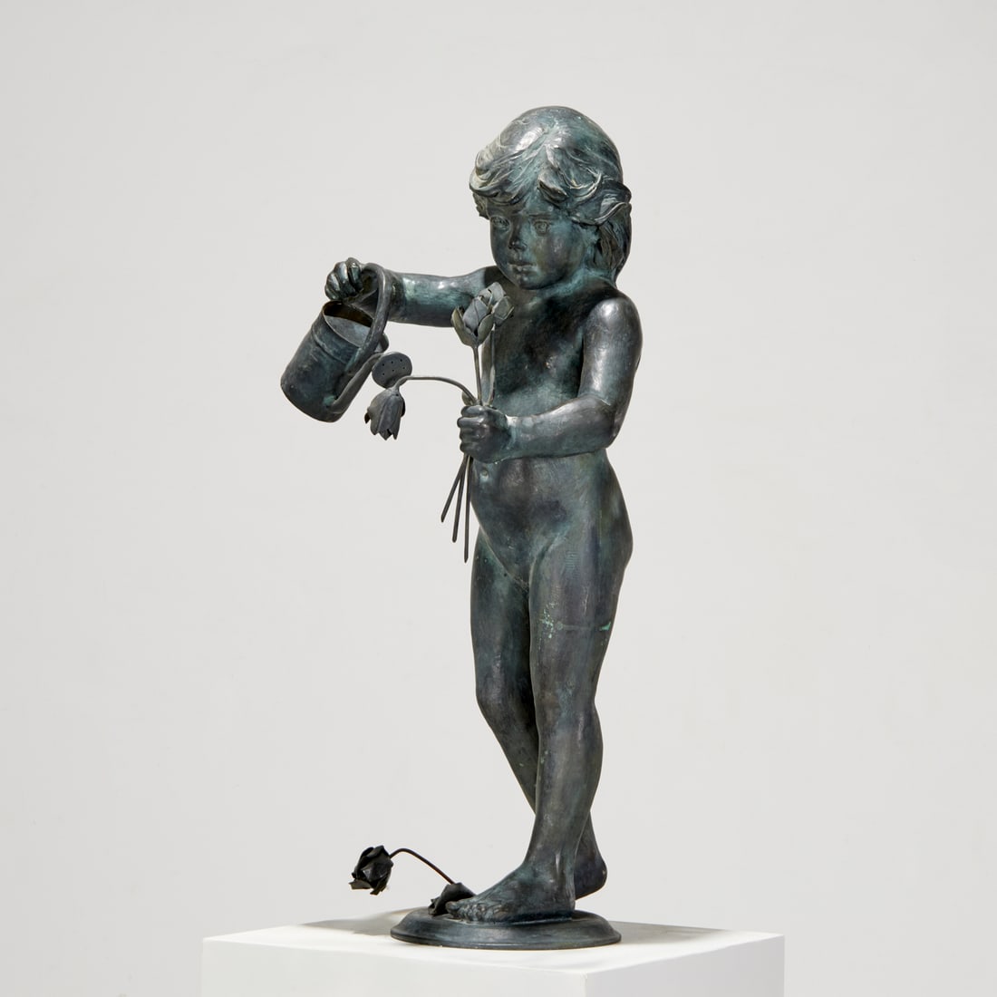 Glenna Goodacre, patinated bronze, 1984: Glenna Goodacre, patinated bronze, 1984, Glenna Maxey Goodacre (American, 1939-2020), Child Watering Flowers, signed and dated base, edition no. 4/21, displayed on white plinth, with interior plumbing