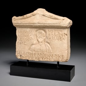 Greek limestone funerary stele