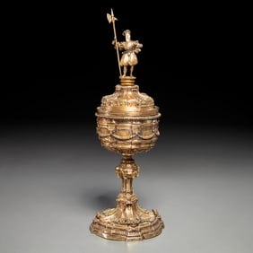 Continental silver gilt cup and figural cover