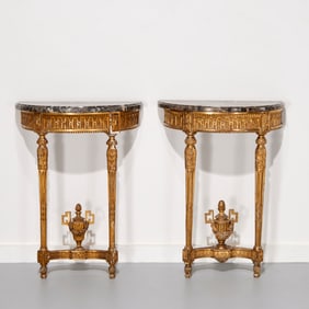 Pair Louis XVI giltwood marble top consoles