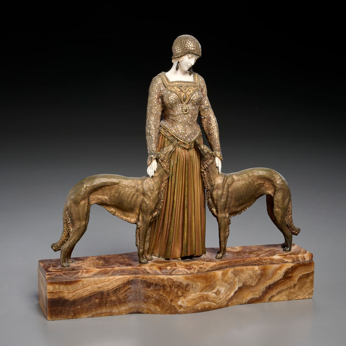 Demetre Chiparus, bronze, ex Sotheby's: Demetre Chiparus, bronze, ex Sotheby's, Demetre Chiparus (Romanian, 1886-1947), "Les Amis Toujours", c. 1920, cold painted and patinated bronze figure flanked by Russian wolfhounds, raised on onyx bas