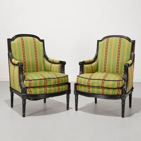 Pair Louis XVI style ebonized bergeres