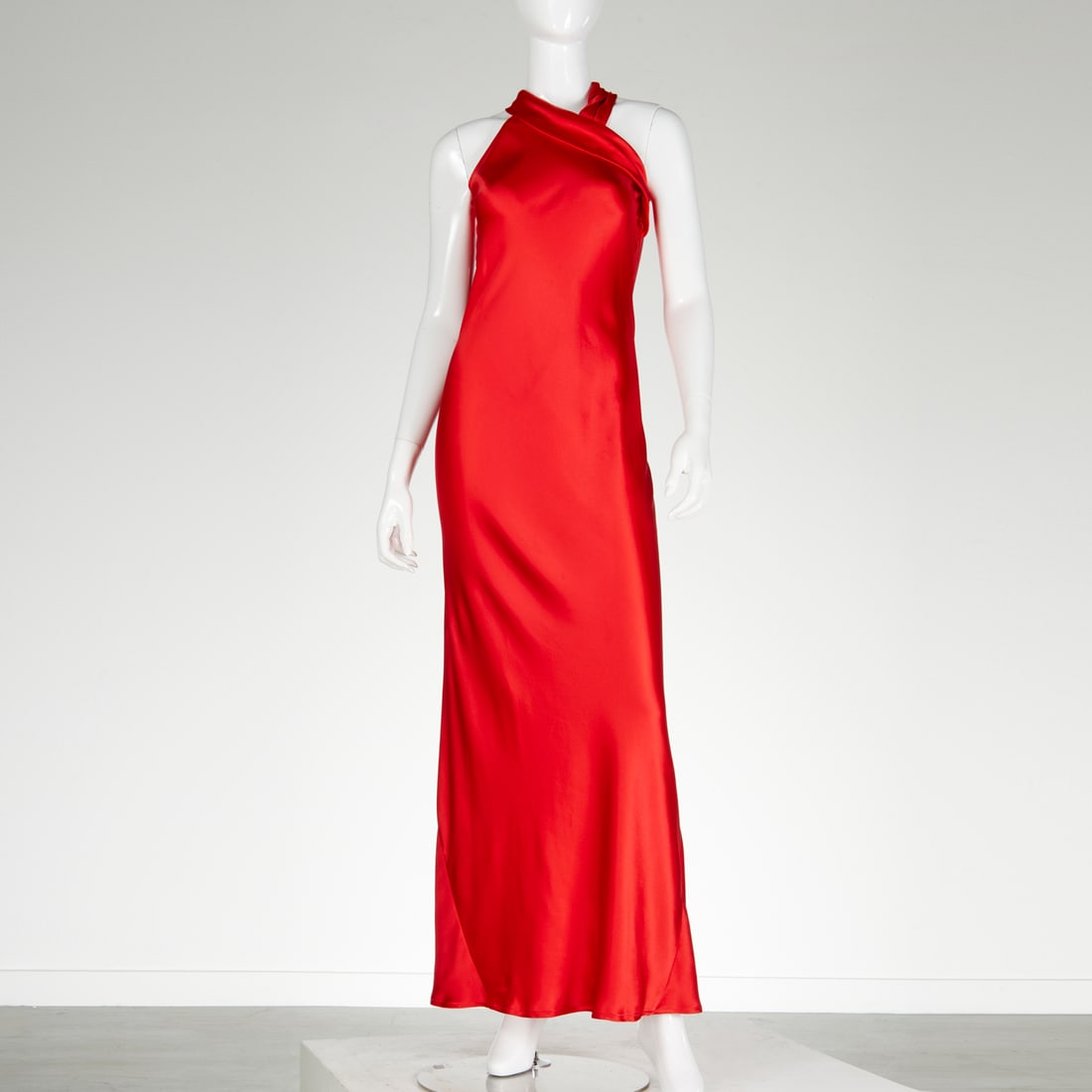 Galvan London Pandora Halter Column Gown: Galvan London Pandora Halter Column Gown, 21st c., in red silk with knotted halter neck, draped design, back zip closure, FR 36, US 4 Provenance: From an Upper East Side Fashion collection