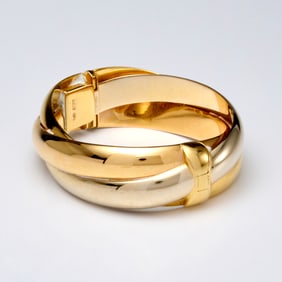 Twisted hinged 18k gold bangle bracelet