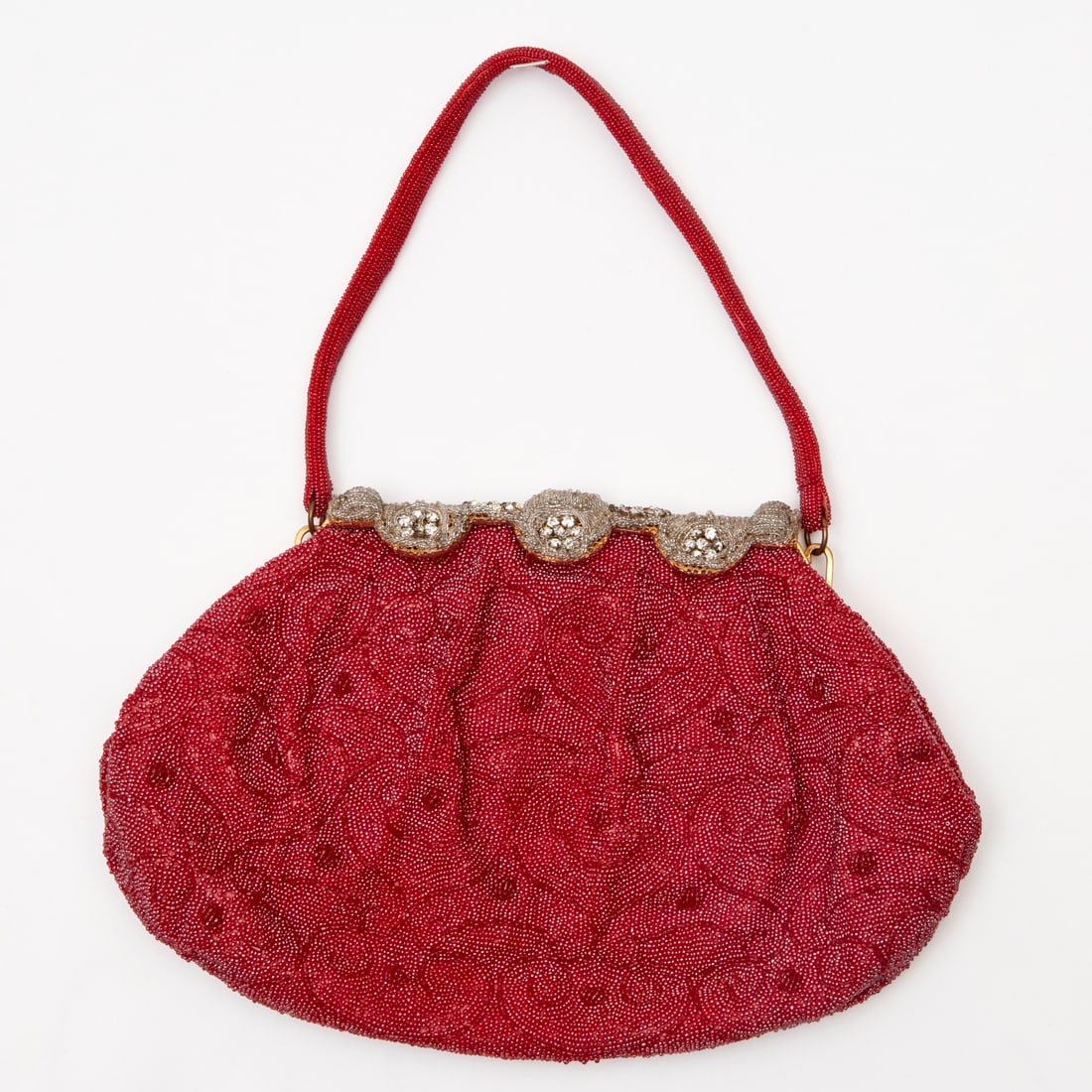 Vintage Red Micro Bead Evening Bag: Vintage Red Micro Bead Evening Bag, 20th c., Made in France, with gold tone frame adorned in silver beading and sequins, single strap handle, red satin interior with pockets to each side, satin change