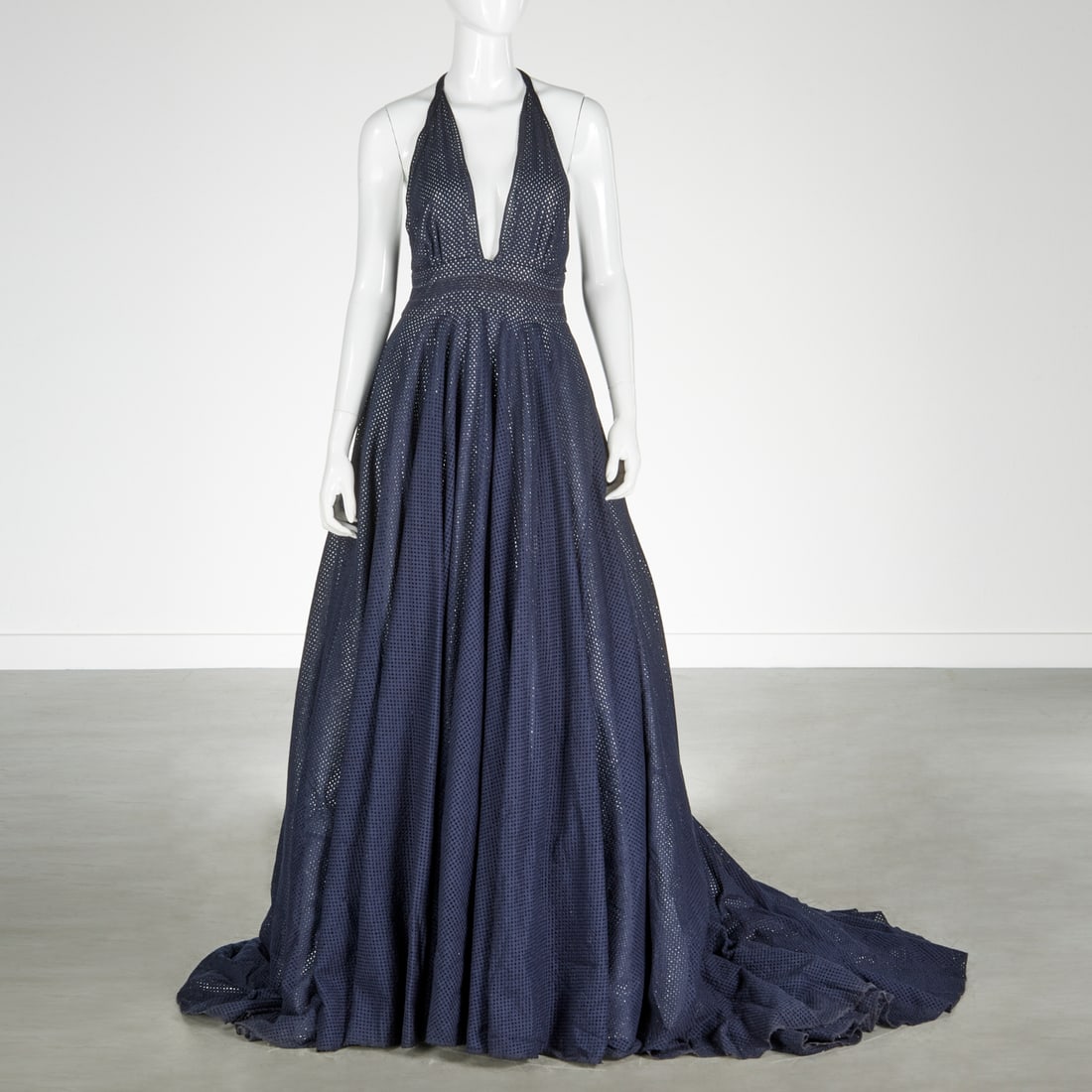 Sophie Theallet navy halter evening ballgown: Sophie Theallet navy halter evening ballgown, 21st c., layered with peekaboo silver showing through, plunging neckline, zipper back, longer train in back, multiple layers creating a dramatic skirt, bu