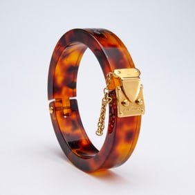 Louis Vuitton tortoise print lucite bracelet