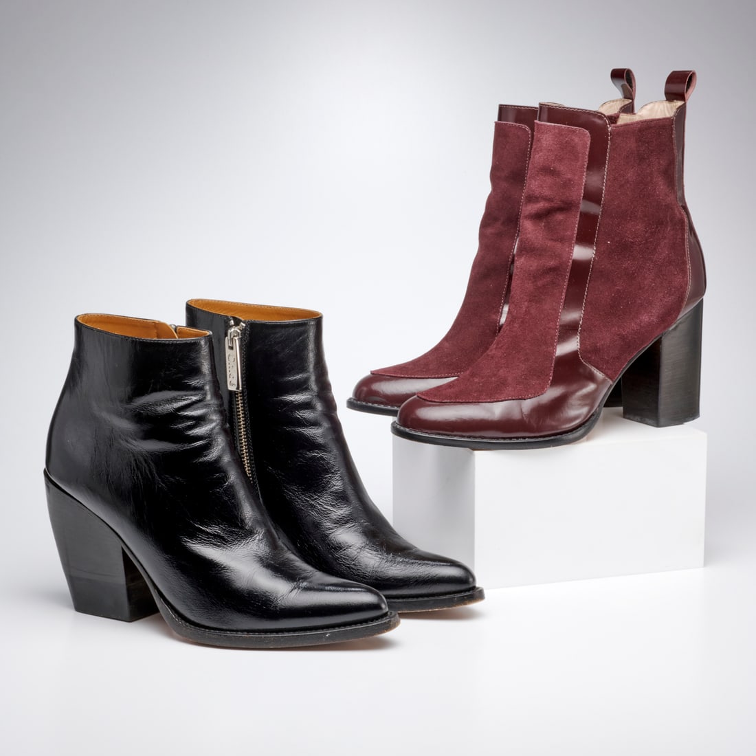 Designer ankle boots, size 40: Designer ankle boots, size 40, 21st c., incl. (1) Zimmerman burgundy suede with leather, 3.5" heel, side zip, (1) Chloe black leather with logo silver zipper, 4"heel Provenance: From an Upper East Sid