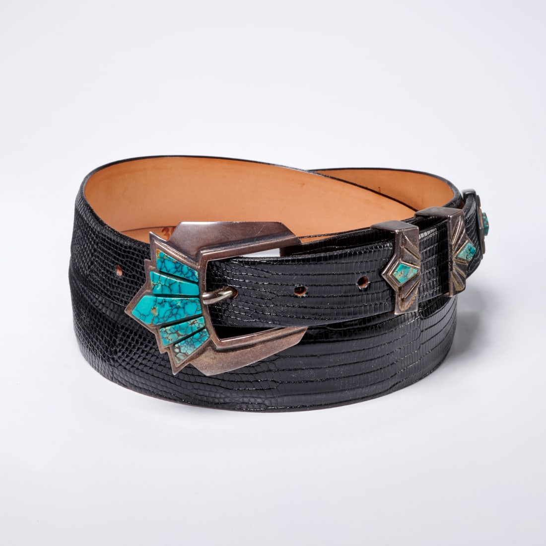 James Reid Lizard belt & Sterling turquoise buckle: James Reid Lizard belt & Sterling turquoise buckle, 20th c., Made in Sante Fe, size 36 lizard belt 1 1/8"w, with sterling turquoise tip, stamped James Reid, Genuine Lizard, buckle in sterling with row