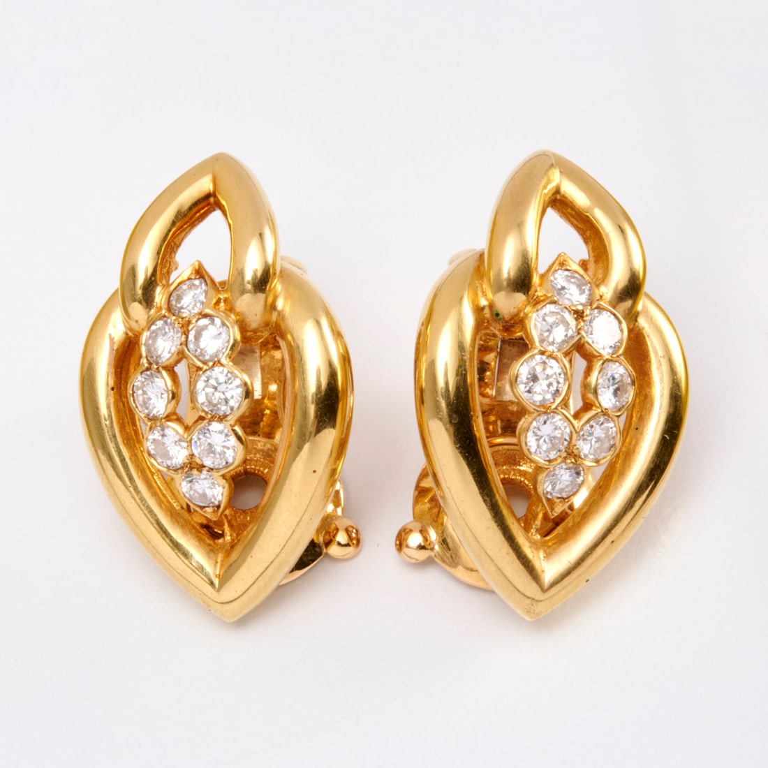 Van Cleef & Arpels Diamond & 18K ear clips: Van Cleef & Arpels Diamond & 18K ear clips, With 1979 original store receipt & Van Cleef appraisal 1979, Valerie style in gold with 16 round diamonds totaling approx. 1.33 cts. stamped VCA, 750, 48931