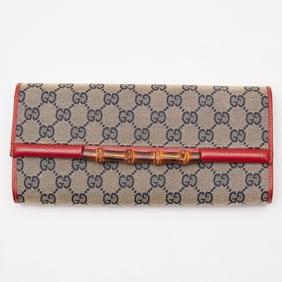 Rare Gucci GG canvas bamboo bar clutch