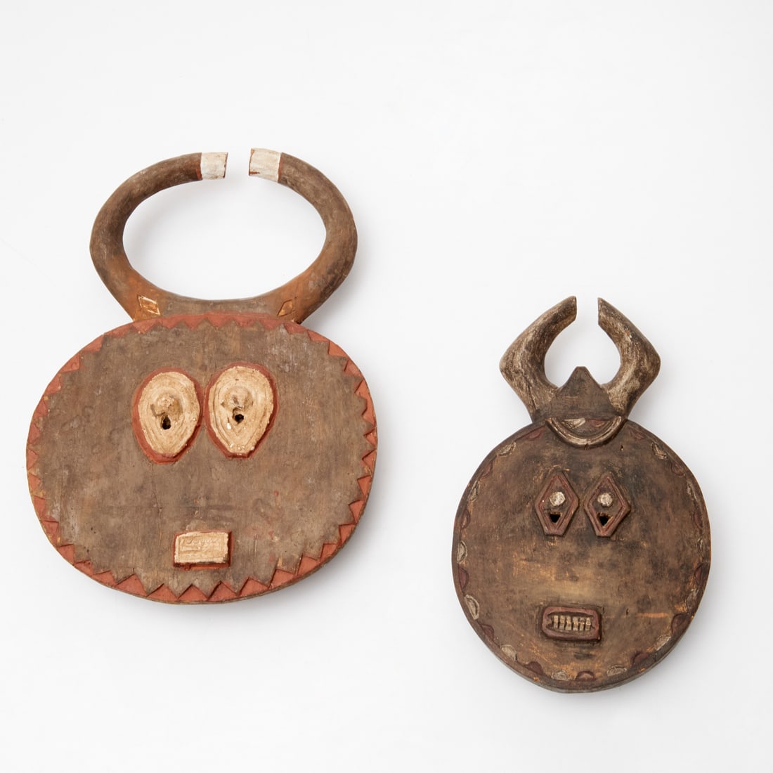 (2) Baule Peoples, polychrome Kple Kple masks (1 of 7)