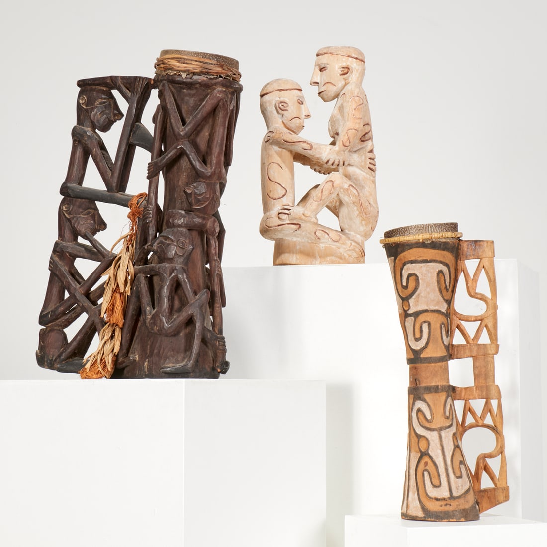 Asmat Peoples, (2) carved drums and (1) figure (1 of 6)