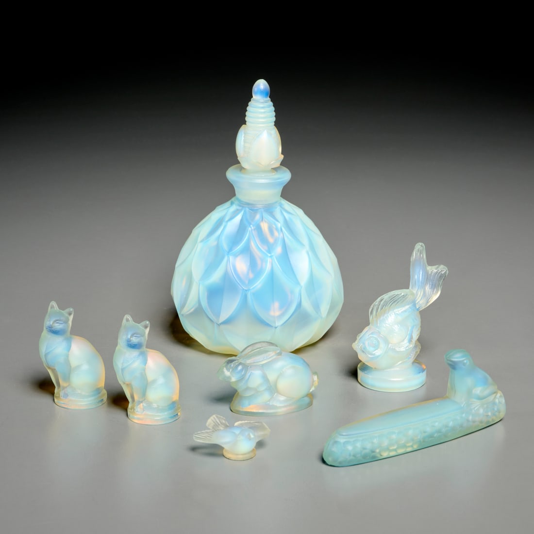Sabino French opalescent glass group: Sabino French opalescent glass group, 20th c., France, (7) pieces, incl. (1) perfume bottle and (6) miniature animal figures, cats, fish, frog, rabbit, and bird, each marked on underside, one with sti