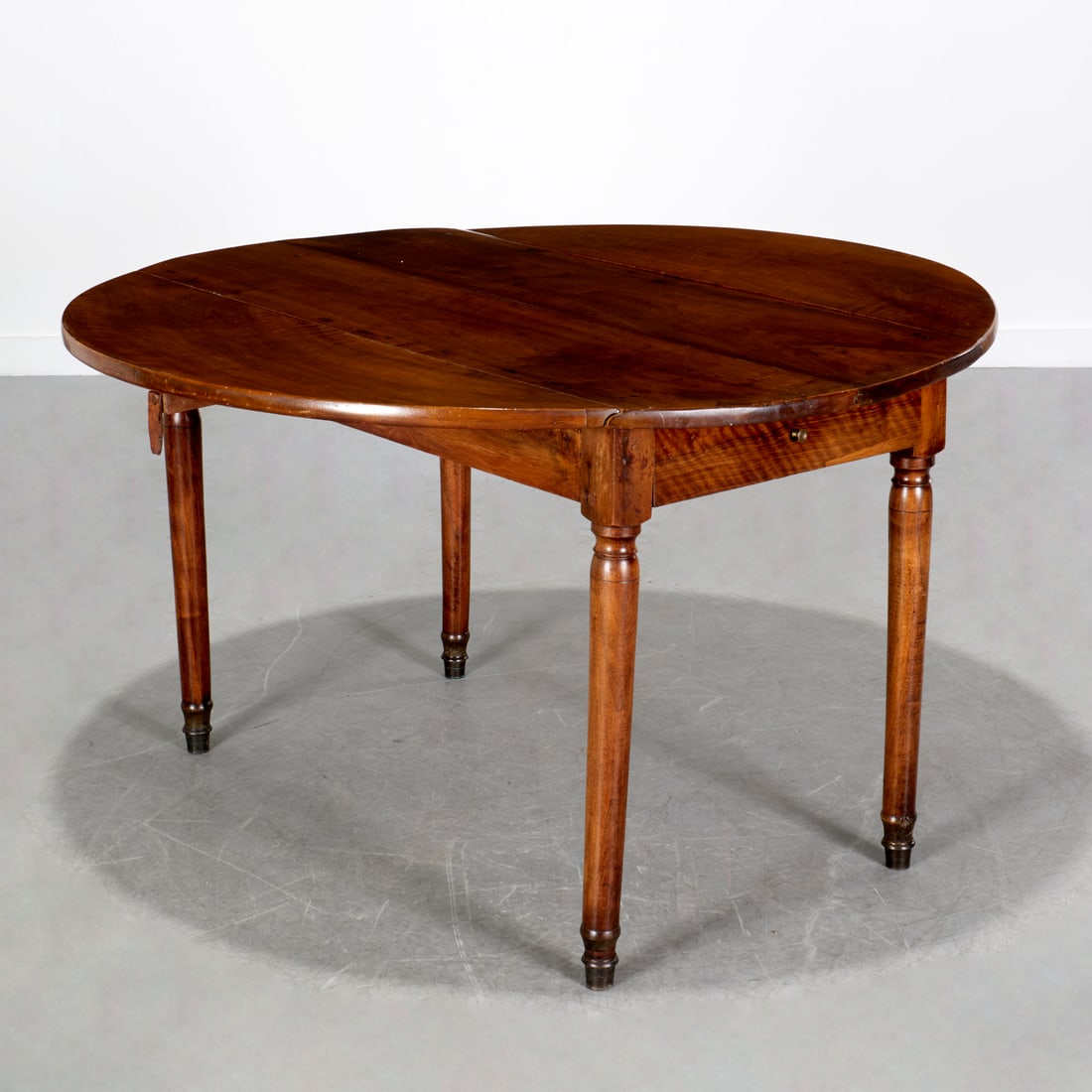 Continental walnut double drop leaf table (1 of 10)