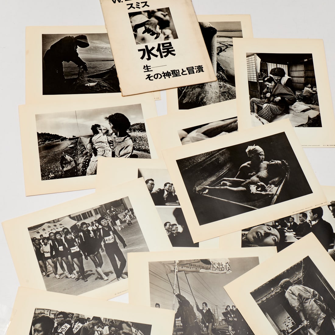 W, Eugene Smith, "Minimata" portfolio: W, Eugene Smith, "Minimata" portfolio, W, Eugene Smith (American, 1918-1978), Minimata: Life-Sacred and Profane. Soju-Sha, Tokyo, 1973, 12 offset prints in paper portfolio, with English text sheet,