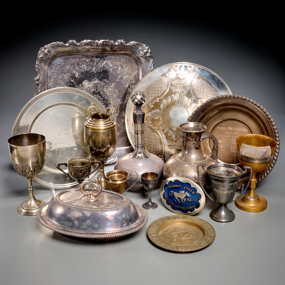 Collection mostly silverplate racing trophies (1 of 9)