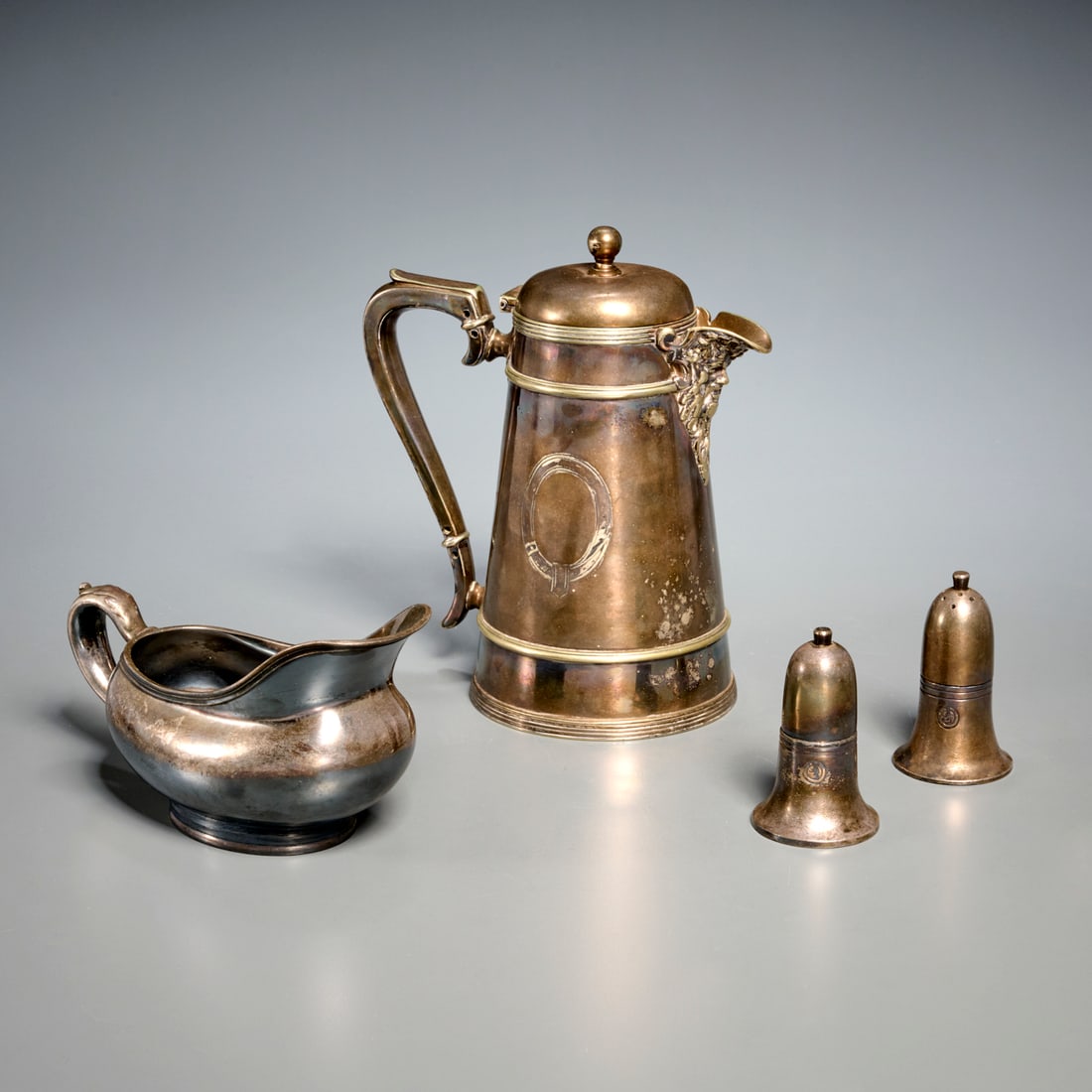 (4) Vintage British hotel silverplated table items: (4) Vintage British hotel silverplated table items, Early 20th c., Incl. "Pirate" spout coffeepot, marked "Tontine Hotel Greenock" (Scotland); salt and pepper, each stamped with Tontine crest on side,