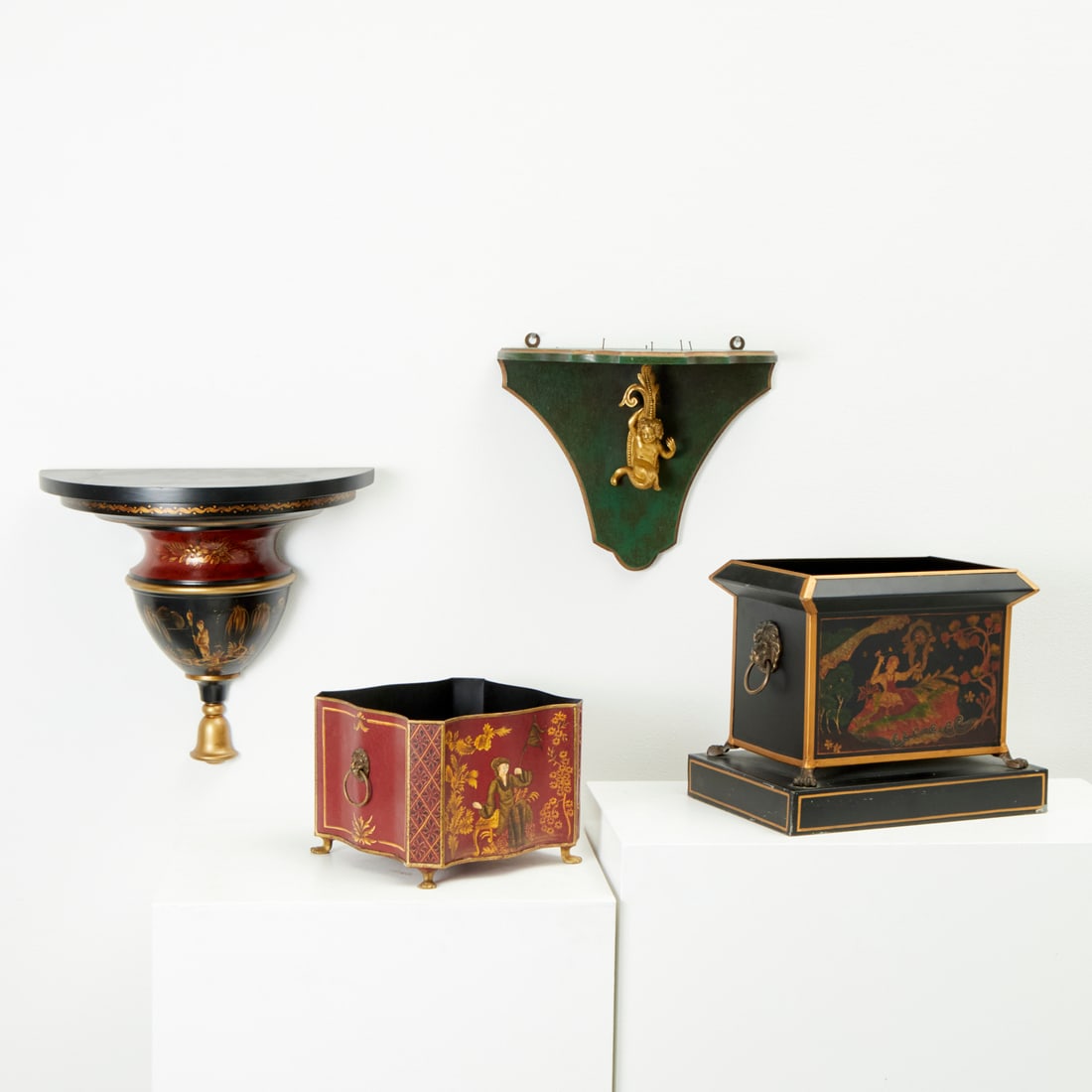 Group Chinoiserie tole jardinieres and brackets: Group Chinoiserie tole jardinieres and brackets, 20th/21st c., incl. a jardiniere with lion ring handles, sticker label "Castilian Imports", faux green marbleized wood bracket decorated with ormolu my