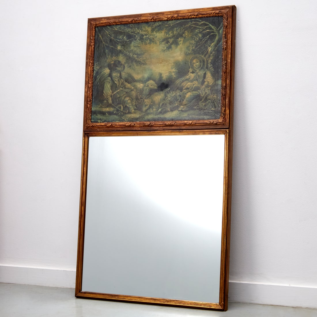 Large Louis XVI style painted trumeau mirror: Large Louis XVI style painted trumeau mirror, 19th c. and adapted, oil on canvas pastoral shepherd and shepherdess scene above rectangular mirror, 29"h x 27"w (mirror), 53.75"h x 29.5"w (overall) Prov