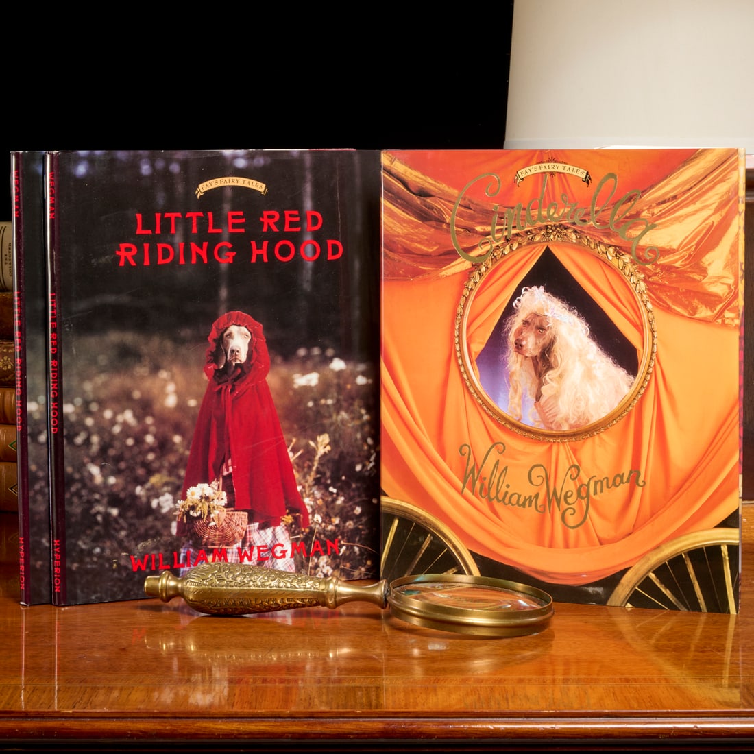 William Wegman, (3) books, signed with drawings: William Wegman, (3) books, signed with drawings, "Cinderella" and 2 copies of "Little Red Riding Hood", each inscribed and signed by Wegman with a drawing, Hyperion Books, Fay's Fairy Tales series, st