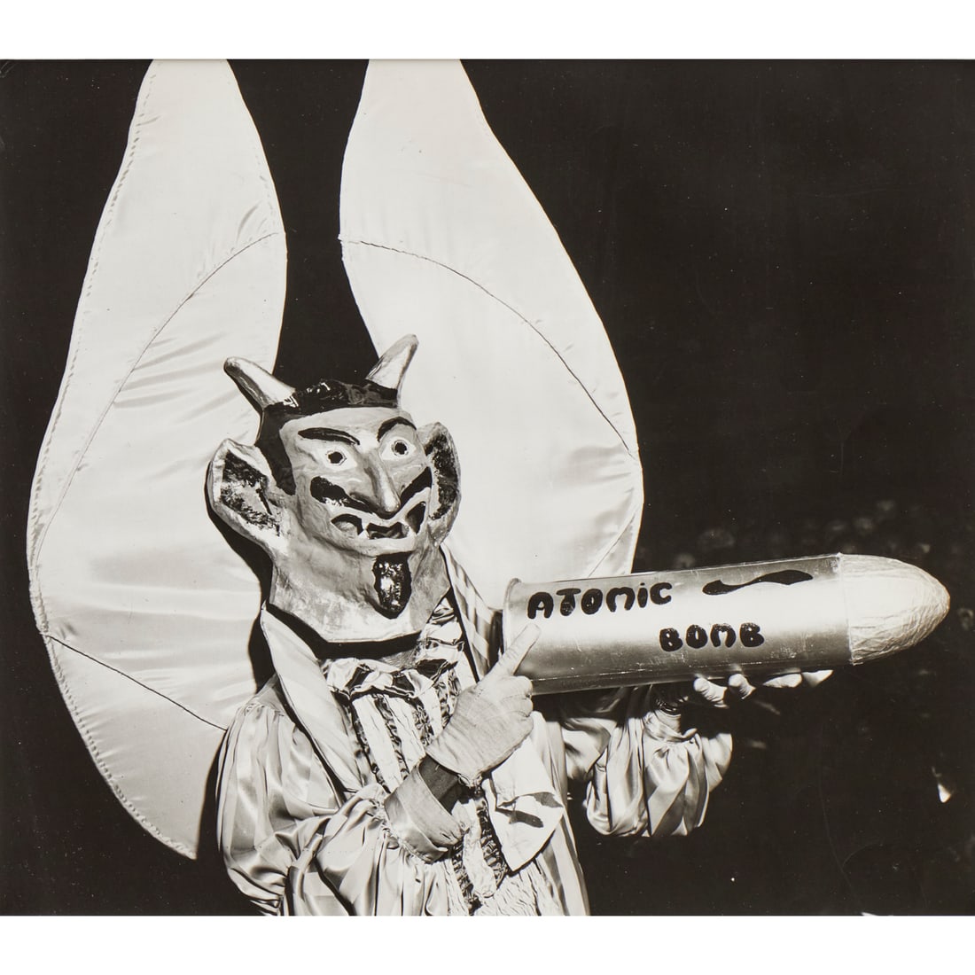 Weegee, gelatin silver print, stamped: Weegee, gelatin silver print, stamped, Weegee (Ascher Fellig, Ukrainian-American, 1899-1968), "Devil with Atomic Bomb", artist stamp verso, 9.25"h x 10.25"w (sight), 20.25"h x 16.25"w (frame)