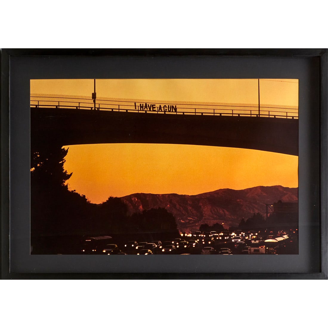 Joe Deutch, large C-print, "I Have a Gun", 2006: Joe Deutch, large C-print, "I Have a Gun", 2006, Joe Deutch (American, 20th/21st c.), "I Have A Gun", edition 1/3, no signature observed, gallery label verso, 24.25"h x 27"w (sight), 32"h x 45"w
