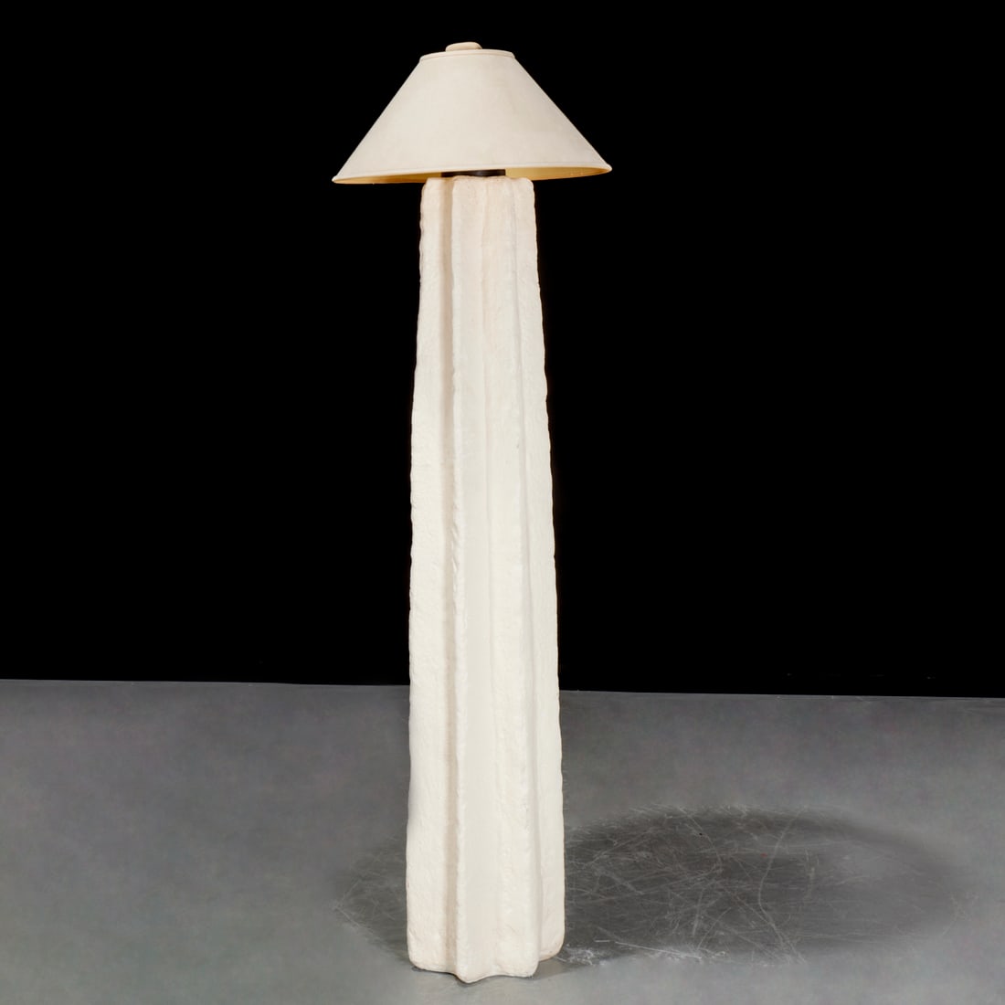 Ron Mann, cast stone floor lamp: Ron Mann, cast stone floor lamp, Late 20th c., California, of tapering ribbed design with stone finial, three lights, unmarked, 74"h x 13"dia Provenance: A Private Collection: Rumson, NJ