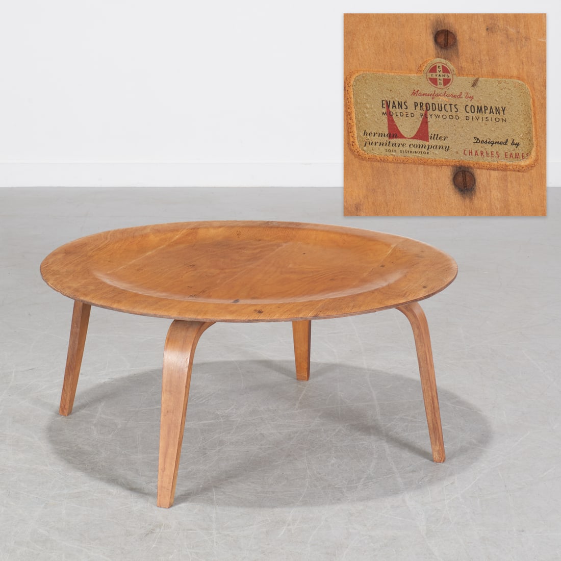 Eames for Herman Miller, coffee table, c. 1945: Eames for Herman Miller, coffee table, c. 1945, c. 1945, first generation CTW table, molded plywood, round top on rounded legs, original decal label underside: Manufactured by Evans Products Company,