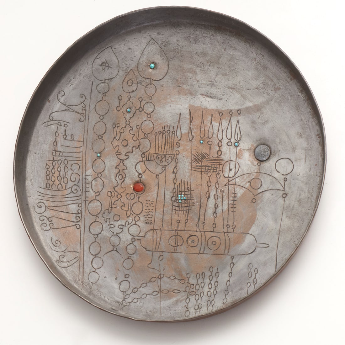 Sadegh Tabrizi, mixed media sculpture: Sadegh Tabrizi, mixed media sculpture, Sadegh Tabrizi (Iranian, 1939-2017), hammered copper dish with engraved design and inset coin and glass or stone jewels, incised signature inside rim, .75"h