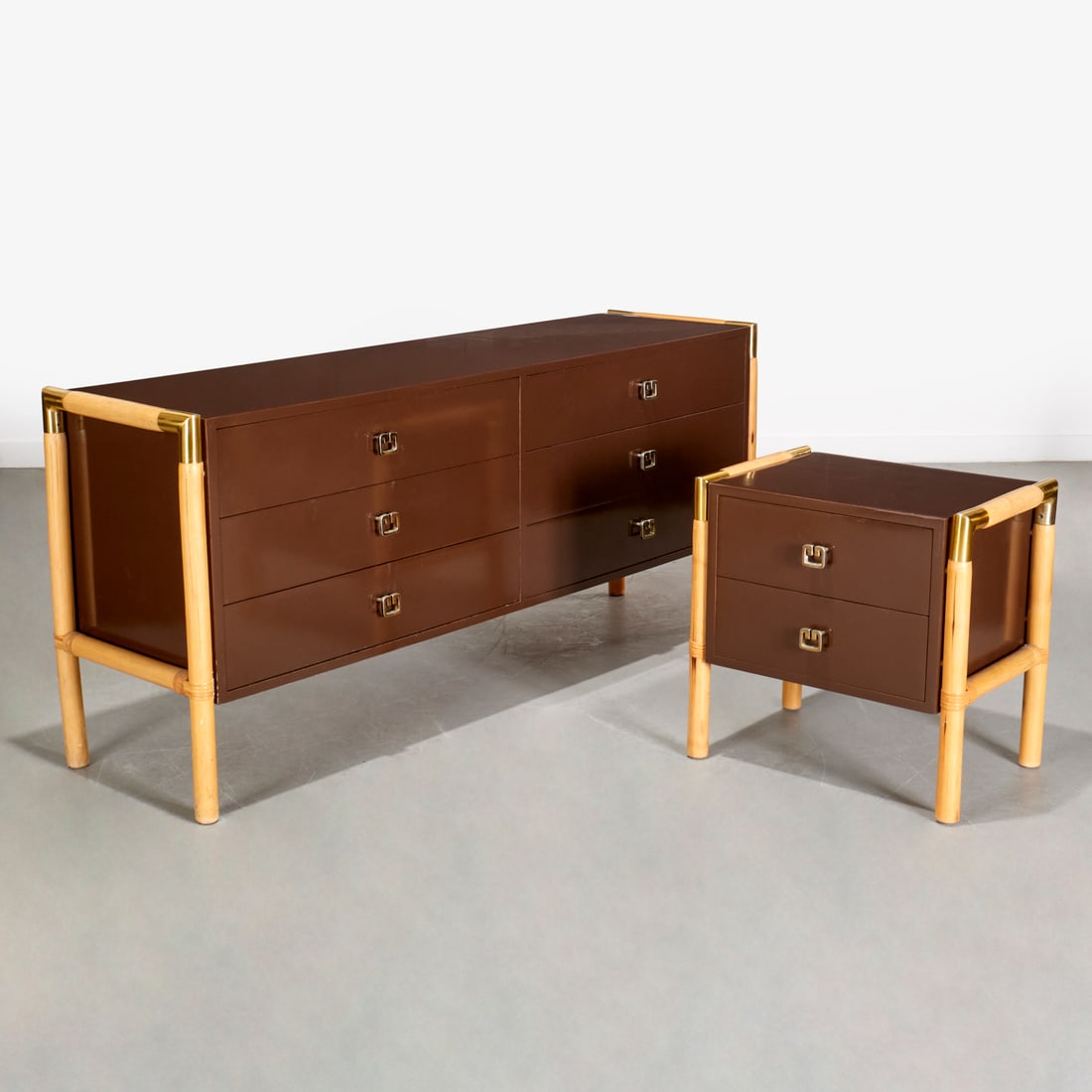 Giovanni Banci (attrib), dresser and nightstand: Giovanni Banci (attrib), dresser and nightstand, c. 1970/80s, Italy, brown lacquer with brass mounted bamboo frame, unmarked, 29"h x 65.5"w x 18"d (dresser), 22"h x 22"w x 15.5"d Provenance: Property 