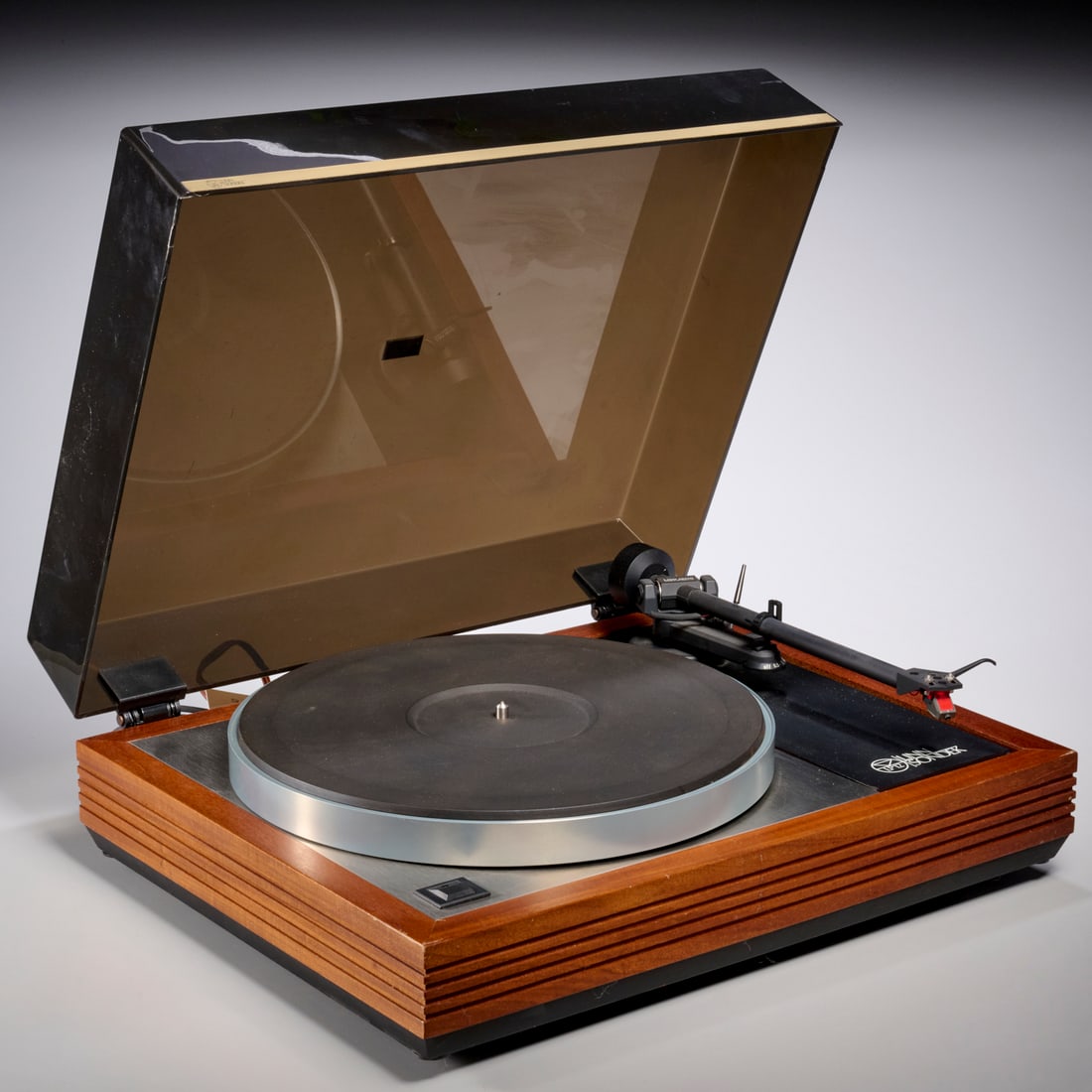 Vintage Linn Sondek LP12 Transcription turntable: Vintage Linn Sondek LP12 Transcription turntable, c. 1980s, belt drive turntable, sub chassis, with hinge lid, marked verso, serial no. 032053, 6"h x 17.5"w x 13.75"d