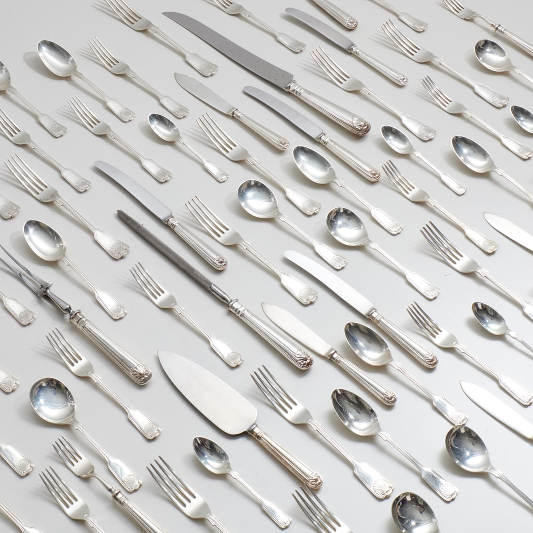 Elizabeth II (170) piece silver flatware service: Elizabeth II (170) piece silver flatware service, Letter dated 1975, '76 or '77, mark of Garrard & Co. Ltd. (except dinner & luncheon knives with mark of Cooper Bros & Sons), Sheffield, Fiddle Thread 