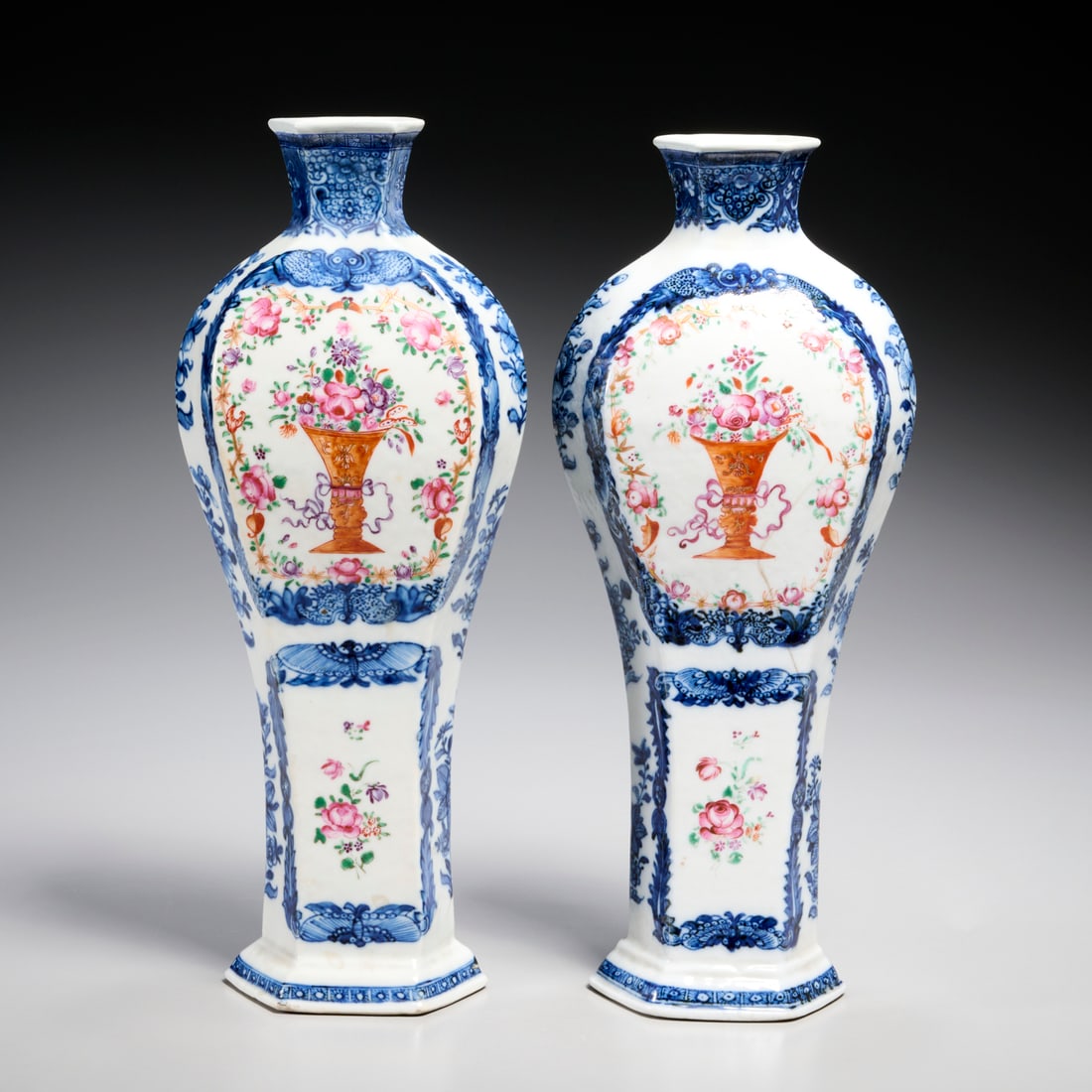 Pair Chinese Export porcelain vases: Pair Chinese Export porcelain vases, Qianlong period (late 18th c.), China, floral bouquet decoration with cobalt surround, unmarked, each 11.75"h x 4.5"w x 2.75"d Provenance: A Private Collection: 10