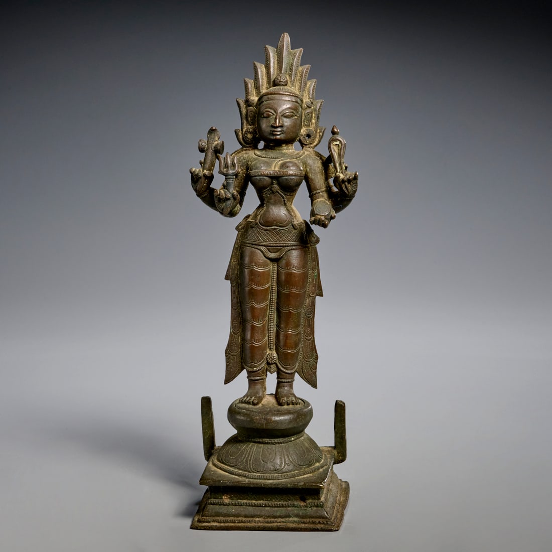South Indian bronze figure of Kali: South Indian bronze figure of Kali, Possibly 12th c. or later, two-piece cast bronze or other copper alloy, 11.5"h x 4"w x 3.25"d Provenance: Property from a Bucks County, PA Estate