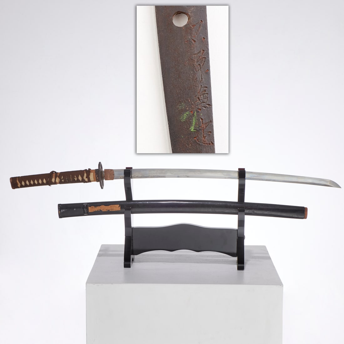 Japanese Meiji period katana, signed: Japanese Meiji period katana, signed, 19th c., Japan, curved blade, tsuka with shagreen and silk wrap, carved menuki, floral style tsuba, with lacquered wood sheath, tang partially inscribed, 35"l Pro