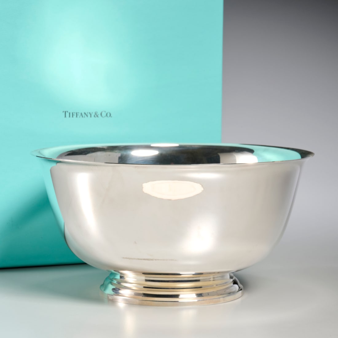 Tiffany & Co., "Paul Revere" sterling silver bowl: Tiffany & Co., "Paul Revere" sterling silver bowl, 20th c., USA, marked underneath, with original Tiffany felt storage bag and box, 4.25"h x 8.5"dia, approx. 25.3ozt Provenance: Property from a Promin
