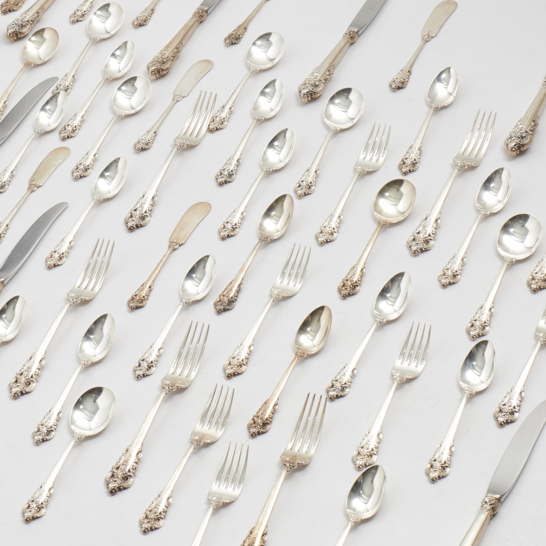 Wallace "Grand Baroque" sterling flatware service: Wallace "Grand Baroque" sterling flatware service, 20th c., USA, (80) pieces, incl. (11) dinner knives, (11) dinner forks, (12) dessert forks, (12) soup spoons, (24) teaspoons, (9) butter knives, (1) 