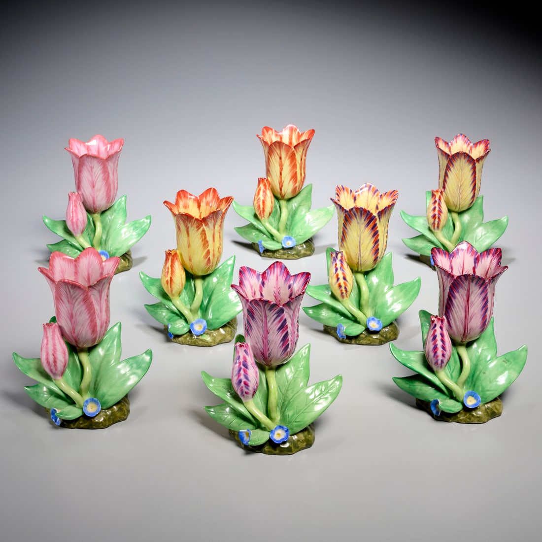 Set (8) Mottahedeh porcelain tulip vases: Set (8) Mottahedeh porcelain tulip vases, Late 20th c., Italy, from the "Sir Humphrey Wakefield, Stately Homes" collection, polychrome decorated in assorted colors, stamped on underside, 6"h x 5.5"w