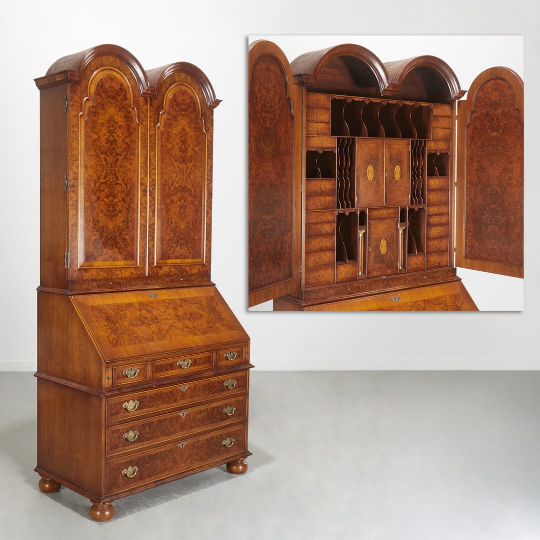 George I style inlaid burlwood secretary: George I style inlaid burlwood secretary, 20th c., good bench made quality, in two parts, double arch crest of double doors revealing interior drawers and compartments, drop down writing surface with