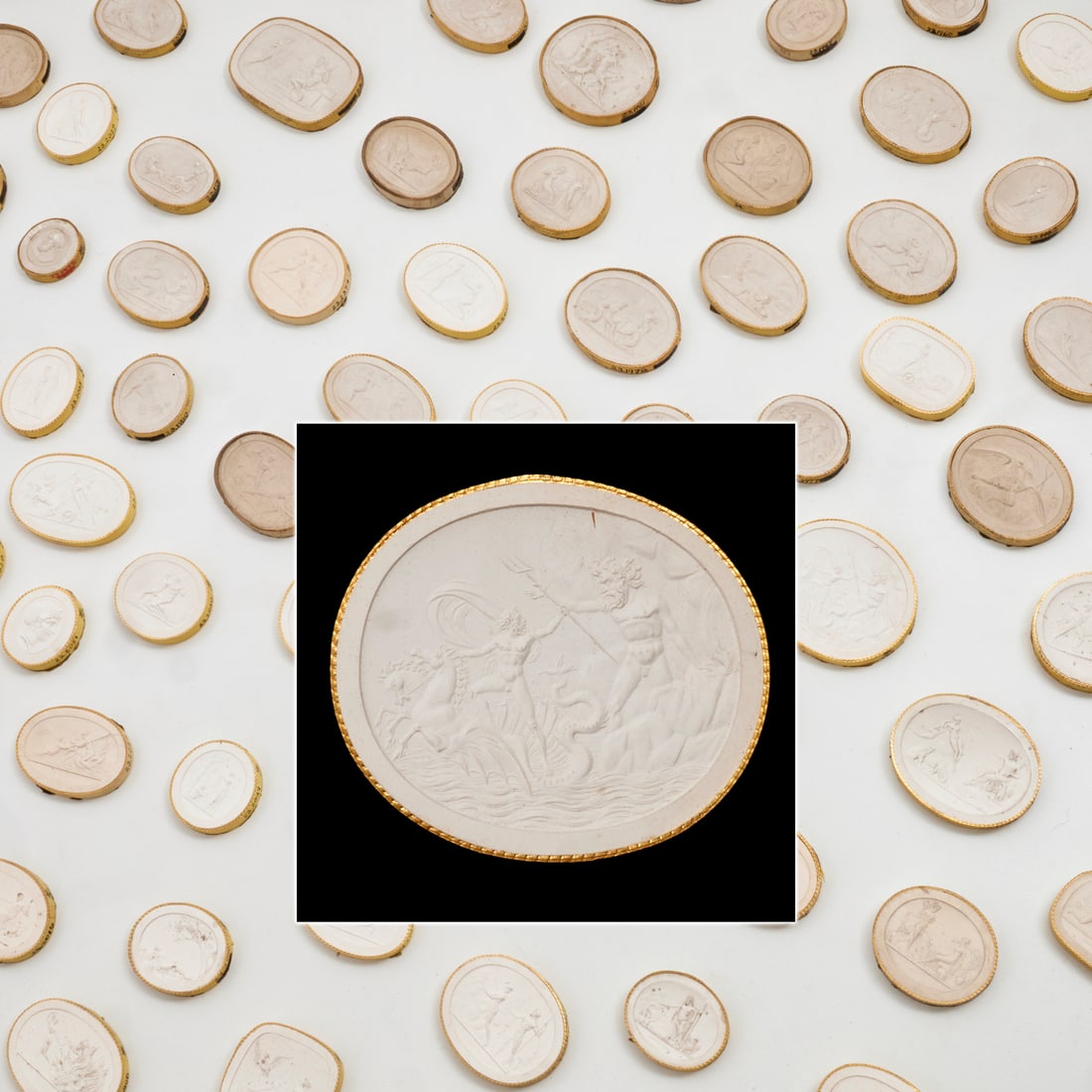 Collection of John Tyrell intaglios, ex museum: Collection of John Tyrell intaglios, ex museum, 19th c., (243) pieces, each Neoclassical work with braided gold rim and paper band signed "John Tyrell" (English, 1790-1868), the collection housed in