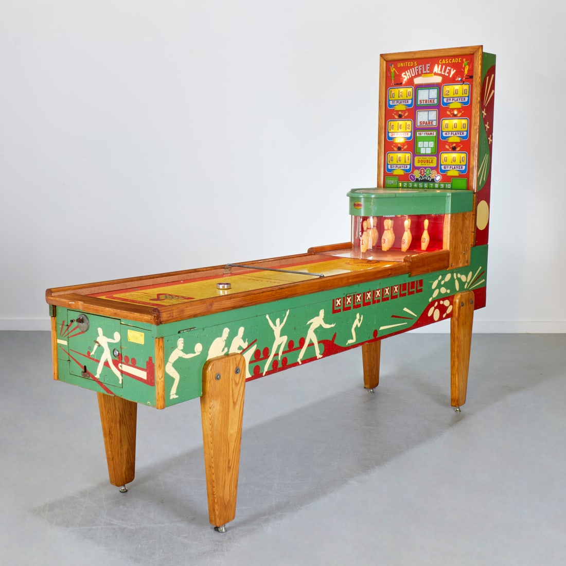 United Cascade "Shuffle Alley" bowling game: United Cascade "Shuffle Alley" bowling game, c. 1950s, six-players, coin operated (10 cents), 75"h x 97"l x 24"w Provenance: A Private Collection: Rumson, NJ
