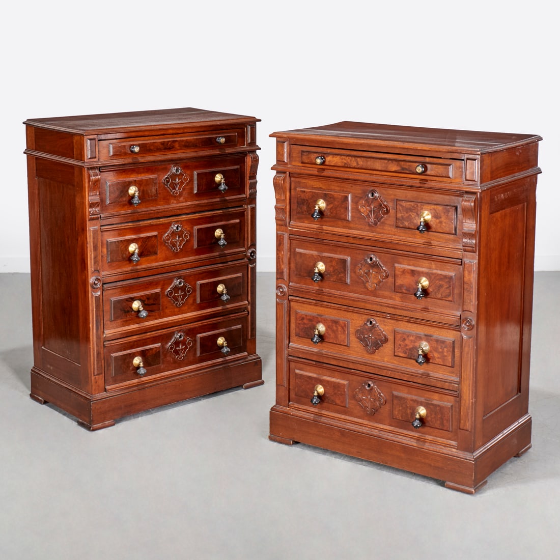 Nice pair Eastlake burl walnut tall chests: Nice pair Eastlake burl walnut tall chests, c. 1880, USA, five drawer front with brass and ebonized bell pulls, floral and scroll carved escutcheons, unmarked, incl. scan of original receipt upon