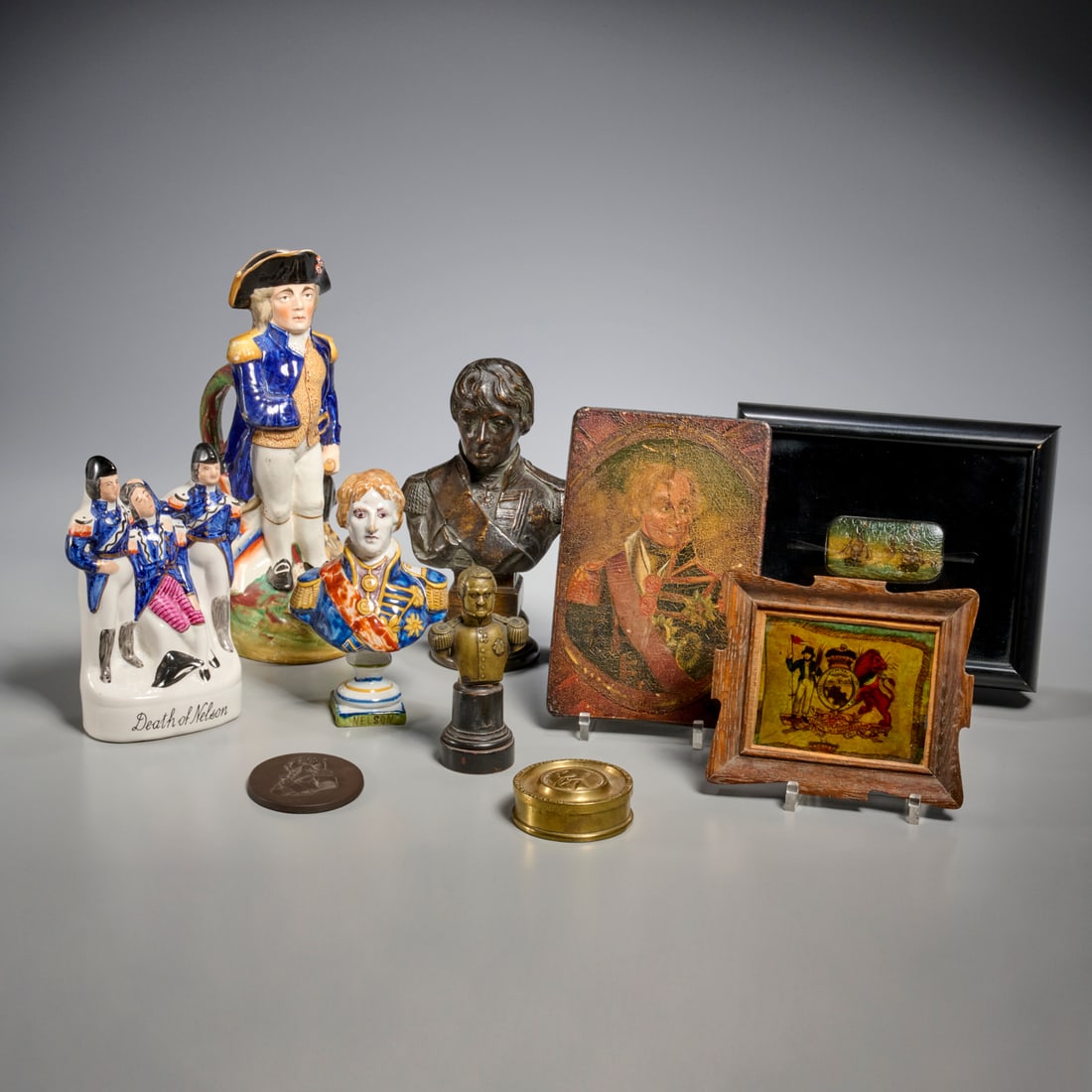 Horatio Nelson, antique ephemera collection: Horatio Nelson, antique ephemera collection, 18th/19th c., (10) pieces, incl. a papier mache snuff depicting the Battle of Trafalgar, mounted and framed; an oil on wood panel portrait, a small