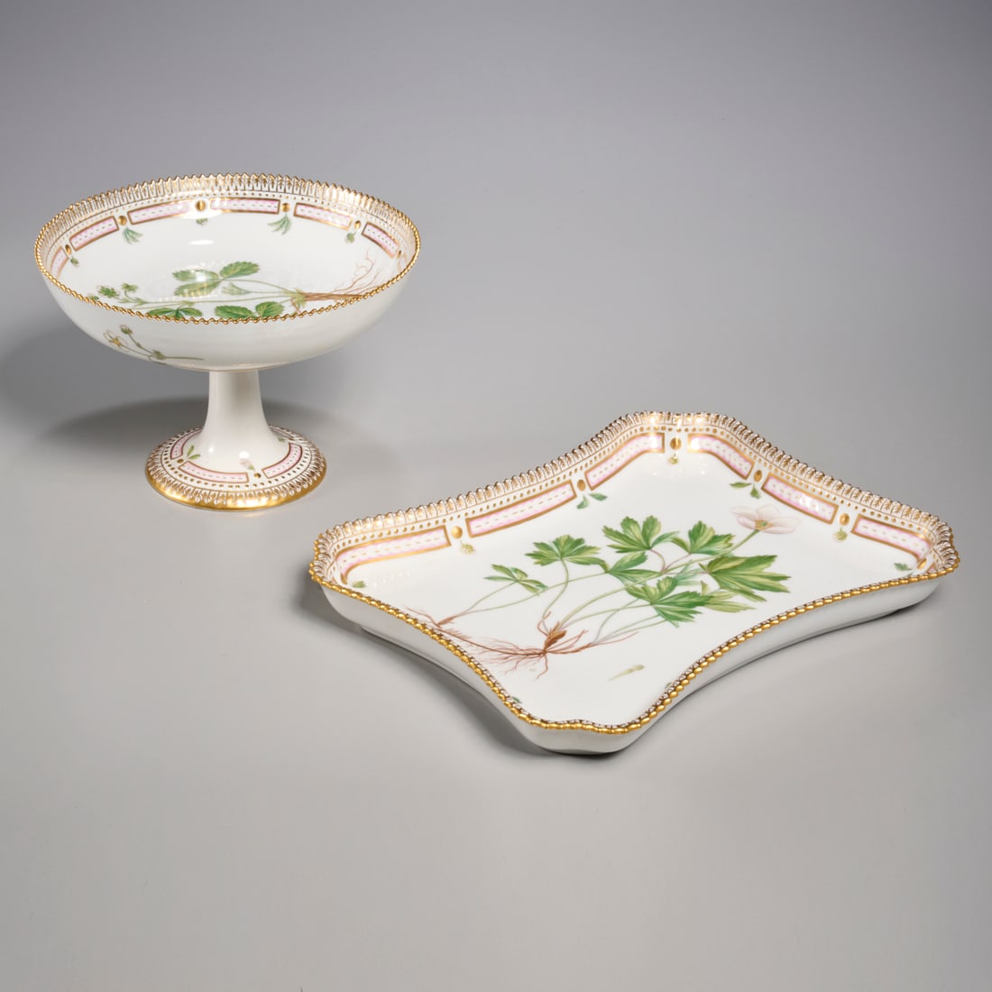 Royal Copenhagen Flora Danica dish and compote: Royal Copenhagen Flora Danica dish and compote, c. 1975-1979, Denmark, (2) pieces, gilt and polychrome enameled porcelain, decorated with Anemone silvestris L. and Fragaria vebra L., sawtooth rim, mar